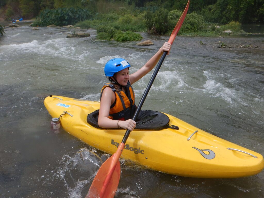 Sleep away Camp tips for first time parents. paddling in the water