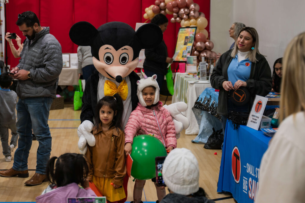 Summer Camps under the age of 6 picture of costume character and small children