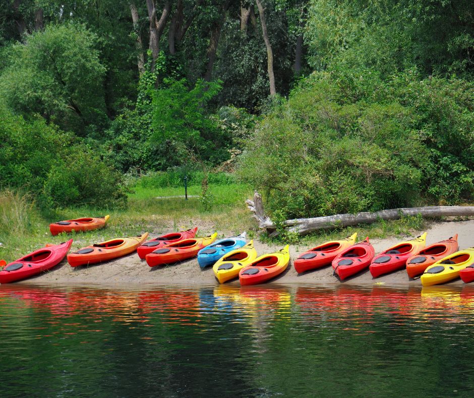 Kayaks await campers on the shores of a Texas summer camp for kids.