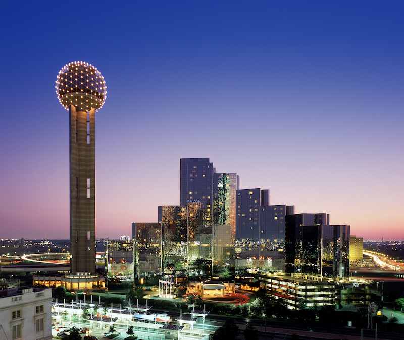 Nighttime view of Dallas skyline, highlighting Reunion Tower, a great spot for family-friendly fun and exploration.